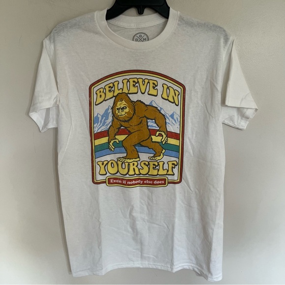 DOM Men’s Graphic Print T-Shirt Size Small White Believe In Yourself Big Foot - Picture 1 of 7